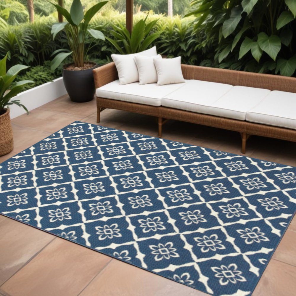 9' X 13' Blue and Ivory Floral Stain Resistant Indoor Outdoor Area Rug