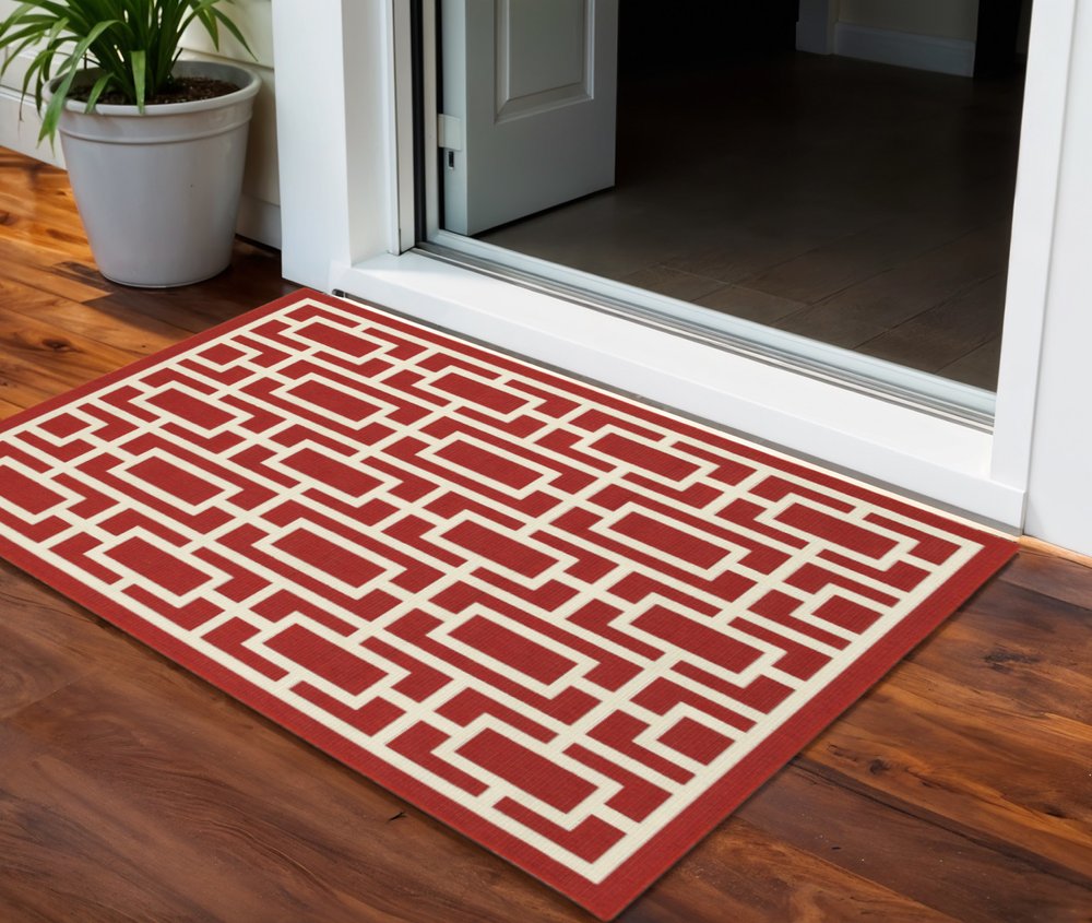 2' X 3' Red and Ivory Geometric Stain Resistant Indoor Outdoor Area Rug