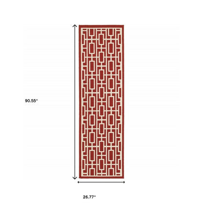 2' X 8' Red and Ivory Geometric Stain Resistant Indoor Outdoor Area Rug