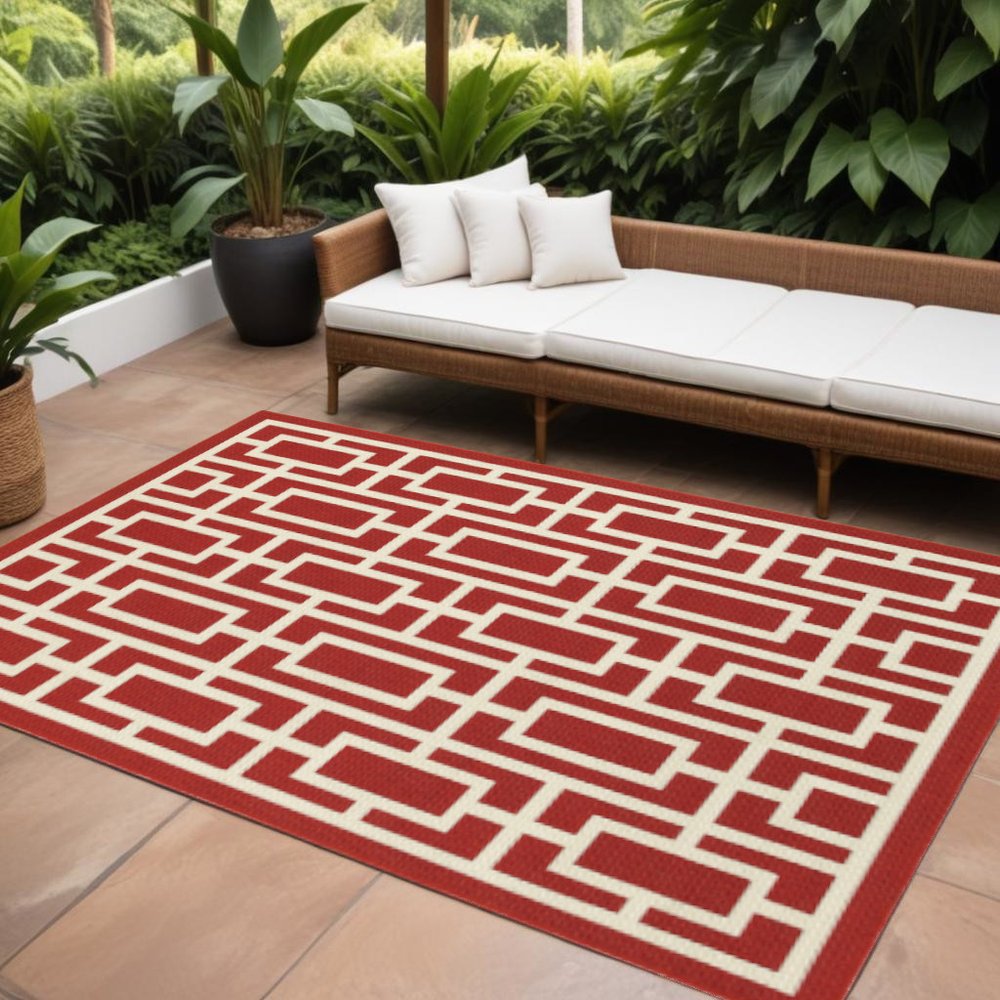 7' X 10' Red and Ivory Geometric Stain Resistant Indoor Outdoor Area Rug