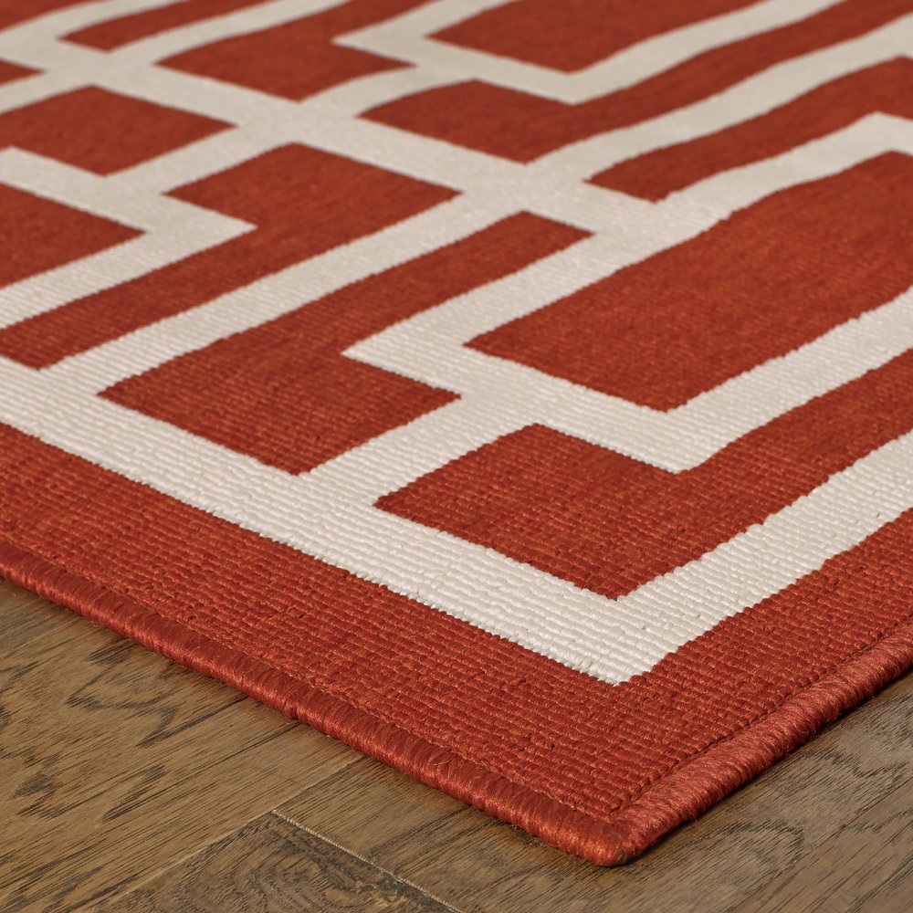8' X 11' Red and Ivory Geometric Stain Resistant Indoor Outdoor Area Rug