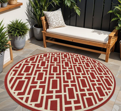 8' X 8' Red and Ivory Round Geometric Stain Resistant Indoor Outdoor Area Rug