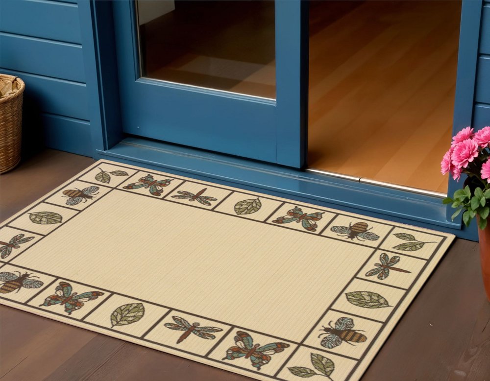 2' X 4' Brown and Ivory Abstract Stain Resistant Indoor Outdoor Area Rug