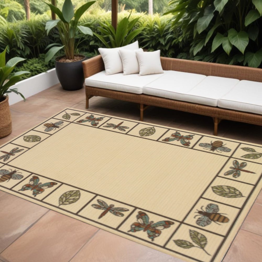 7' X 10' Brown and Ivory Abstract Stain Resistant Indoor Outdoor Area Rug