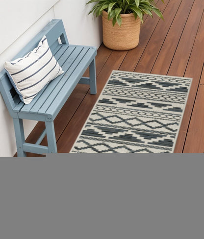 2' X 7' Blue and Beige Geometric Stain Resistant Indoor Outdoor Area Rug