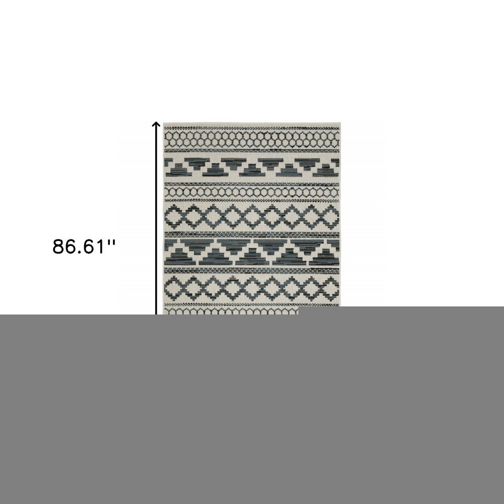 5' X 7' Blue and Beige Geometric Stain Resistant Indoor Outdoor Area Rug