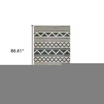 5' X 7' Blue and Beige Geometric Stain Resistant Indoor Outdoor Area Rug