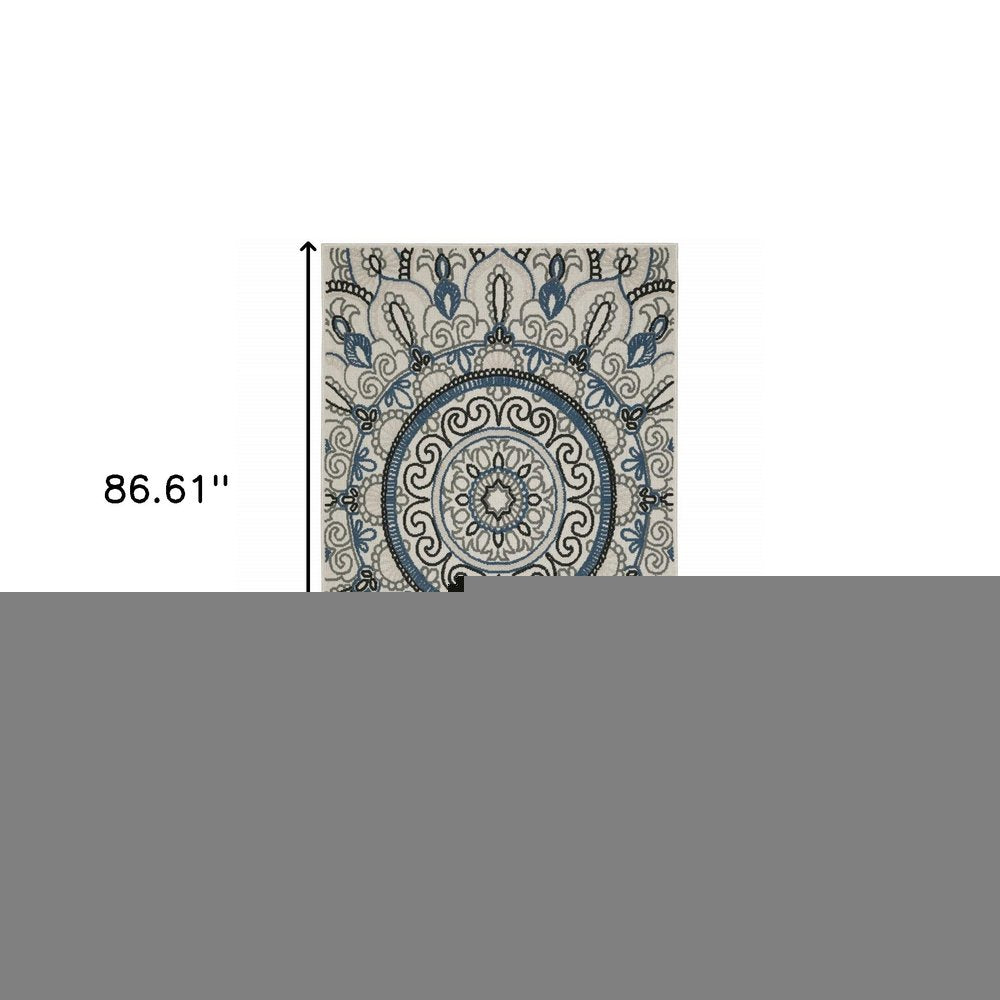 5' X 7' Blue and Beige Geometric Stain Resistant Indoor Outdoor Area Rug