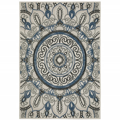 7' X 9' Blue and Beige Geometric Stain Resistant Indoor Outdoor Area Rug