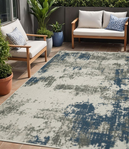 5' X 7' Blue and Beige Abstract Stain Resistant Indoor Outdoor Area Rug