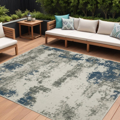 7' X 9' Blue and Beige Abstract Stain Resistant Indoor Outdoor Area Rug
