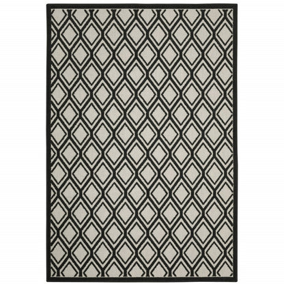 7' X 9' Beige and Black Geometric Stain Resistant Indoor Outdoor Area Rug