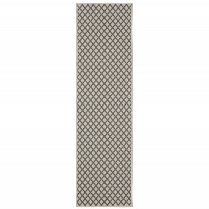 2' X 7' Beige Geometric Stain Resistant Indoor Outdoor Area Rug
