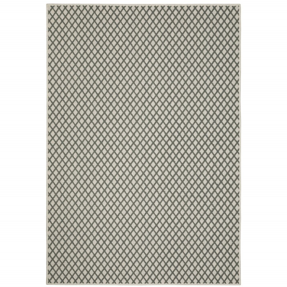 7' X 9' Beige Geometric Stain Resistant Indoor Outdoor Area Rug