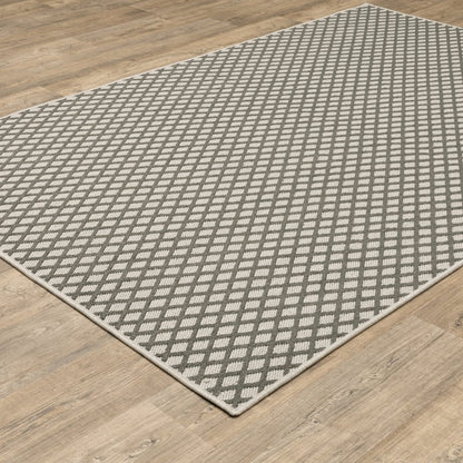 7' X 9' Beige Geometric Stain Resistant Indoor Outdoor Area Rug