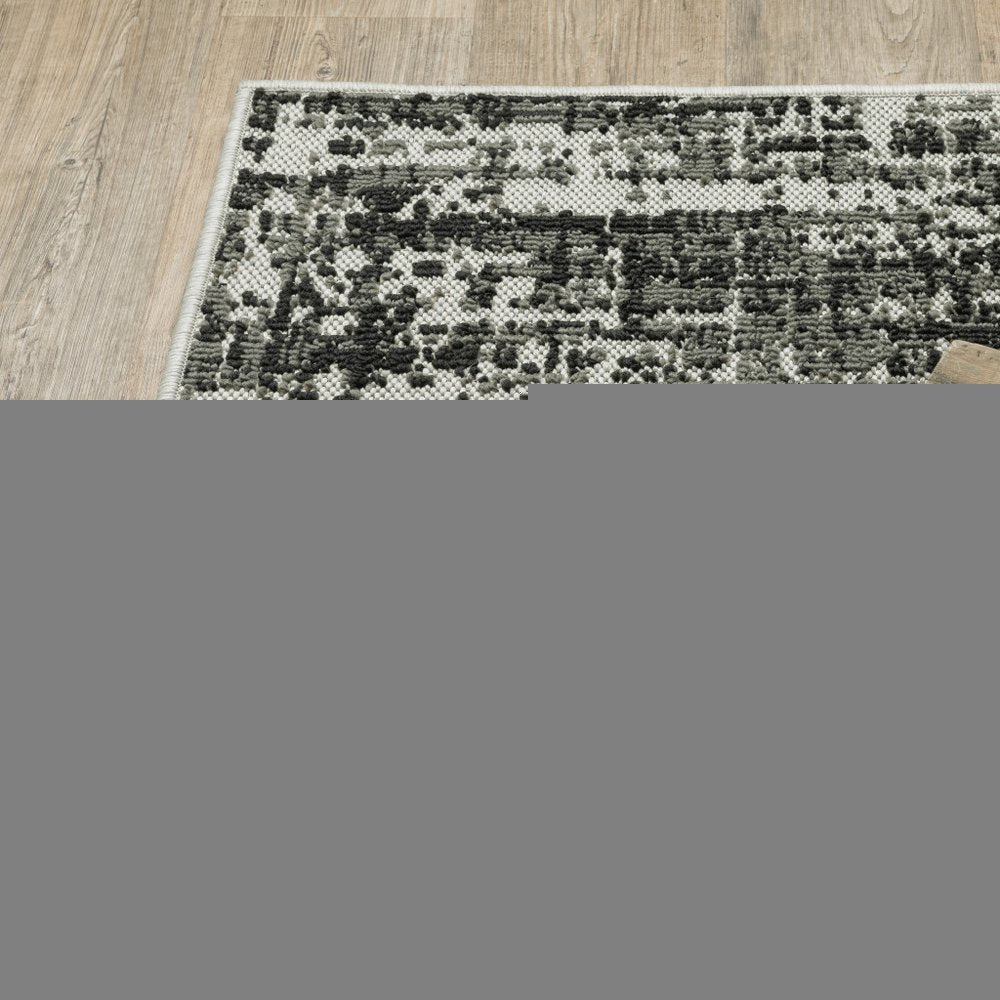 3' X 5' Beige and Black Abstract Stain Resistant Indoor Outdoor Area Rug