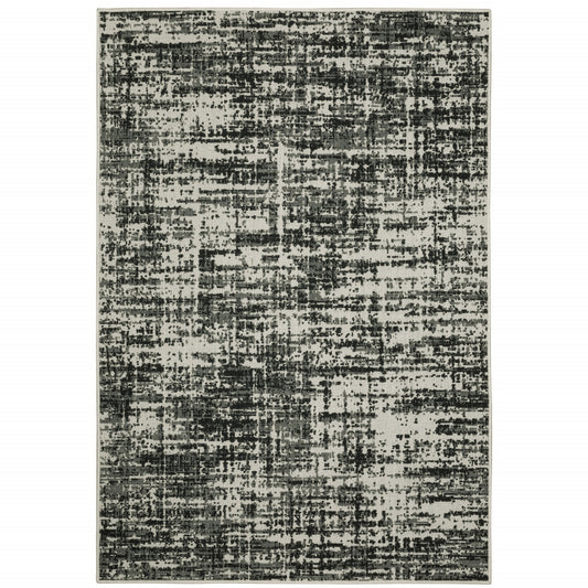 5' X 7' Beige and Black Abstract Stain Resistant Indoor Outdoor Area Rug