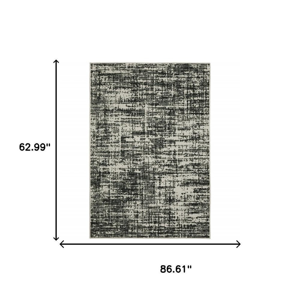 5' X 7' Beige and Black Abstract Stain Resistant Indoor Outdoor Area Rug