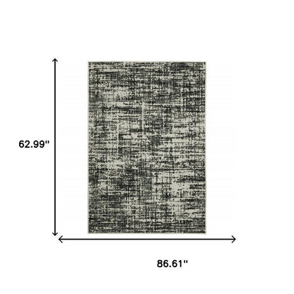 5' X 7' Beige and Black Abstract Stain Resistant Indoor Outdoor Area Rug