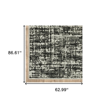 5' X 7' Beige and Black Abstract Stain Resistant Indoor Outdoor Area Rug
