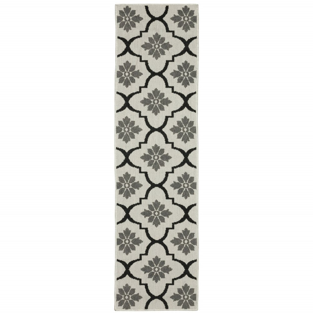 2' X 7' Beige and Black Geometric Stain Resistant Indoor Outdoor Area Rug