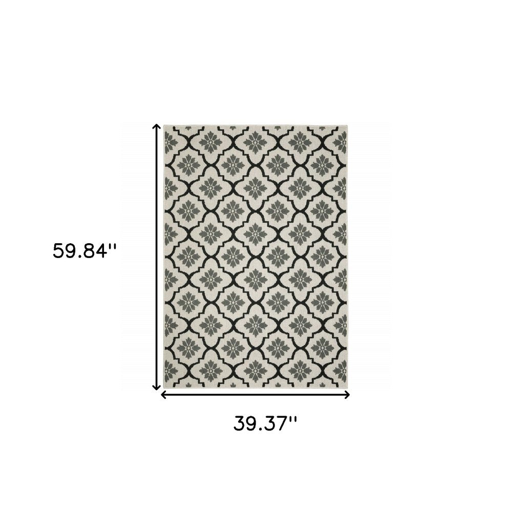 3' X 5' Beige and Black Geometric Stain Resistant Indoor Outdoor Area Rug