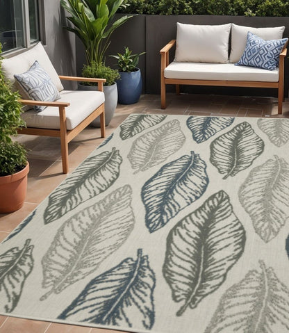 5' X 7' Beige Floral Stain Resistant Indoor Outdoor Area Rug
