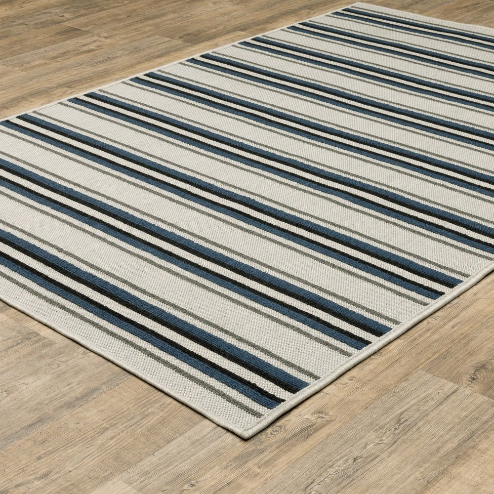 5' X 7' Blue and Beige Geometric Stain Resistant Indoor Outdoor Area Rug