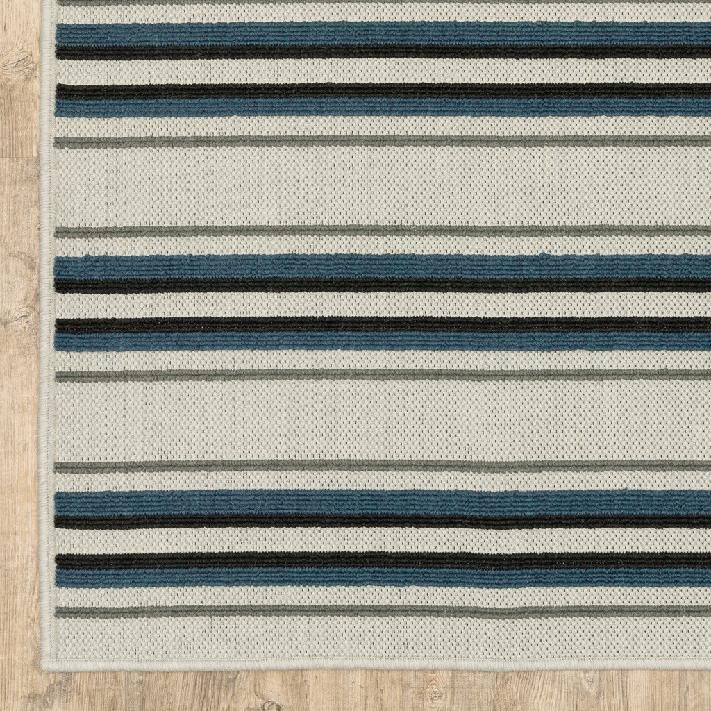 5' X 7' Blue and Beige Geometric Stain Resistant Indoor Outdoor Area Rug