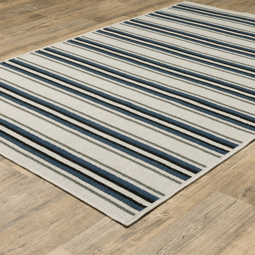 7' X 9' Blue and Beige Geometric Stain Resistant Indoor Outdoor Area Rug