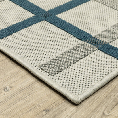 2' X 7' Blue and Beige Geometric Stain Resistant Indoor Outdoor Area Rug