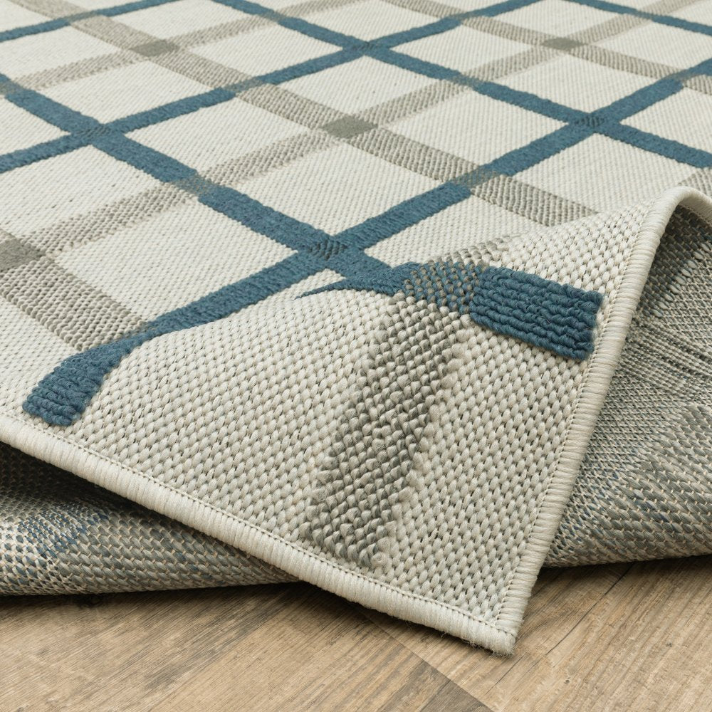 2' X 7' Blue and Beige Geometric Stain Resistant Indoor Outdoor Area Rug
