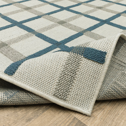 2' X 7' Blue and Beige Geometric Stain Resistant Indoor Outdoor Area Rug