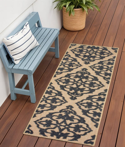 2' X 8' Beige and Black Oriental Stain Resistant Indoor Outdoor Area Rug
