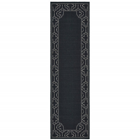 2' X 8' Black and Ivory Stain Resistant Indoor Outdoor Area Rug