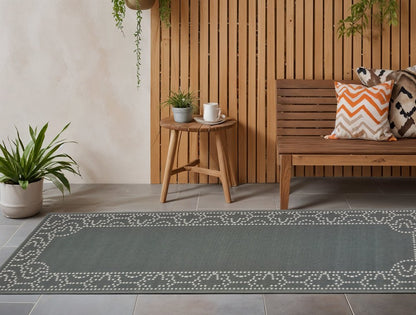 2' X 8' Gray and Ivory Stain Resistant Indoor Outdoor Area Rug