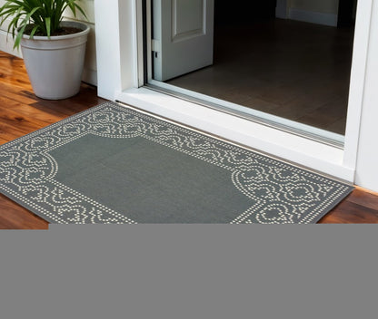 2' X 4' Gray and Ivory Stain Resistant Indoor Outdoor Area Rug