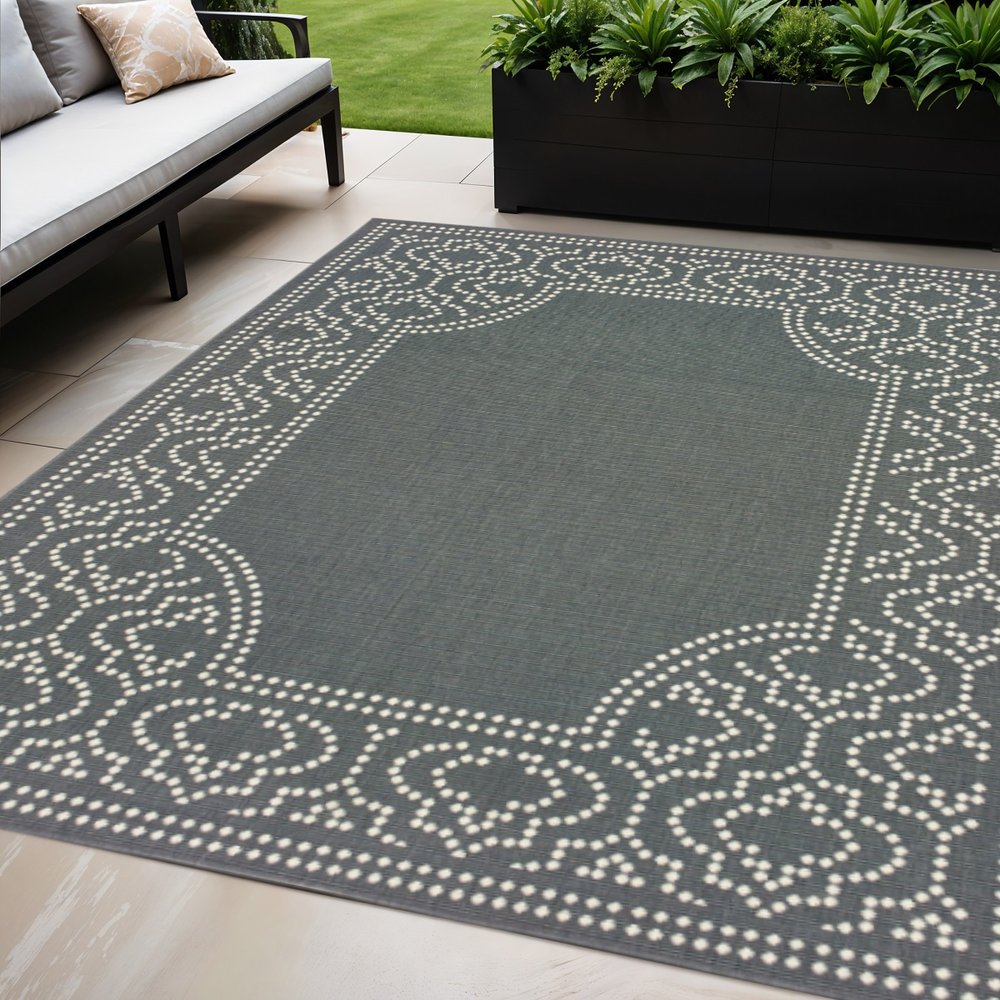 5' X 8' Gray and Ivory Stain Resistant Indoor Outdoor Area Rug