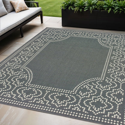 5' X 8' Gray and Ivory Stain Resistant Indoor Outdoor Area Rug
