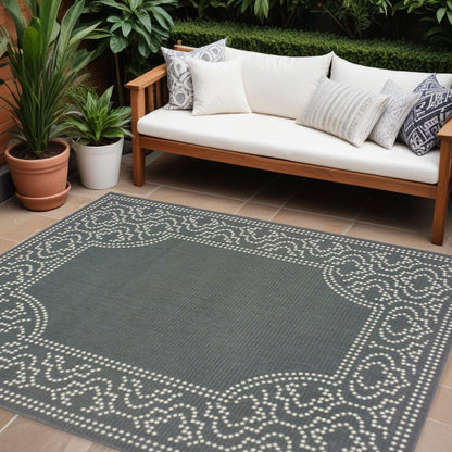 7' X 10' Gray and Ivory Stain Resistant Indoor Outdoor Area Rug