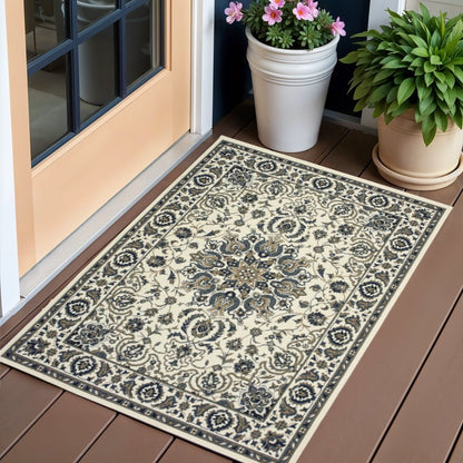 2' X 4' Ivory and Blue Oriental Stain Resistant Indoor Outdoor Area Rug
