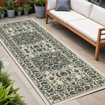2' X 8' Ivory and Blue Oriental Stain Resistant Indoor Outdoor Area Rug