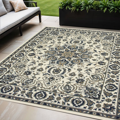 5' X 8' Ivory and Blue Oriental Stain Resistant Indoor Outdoor Area Rug