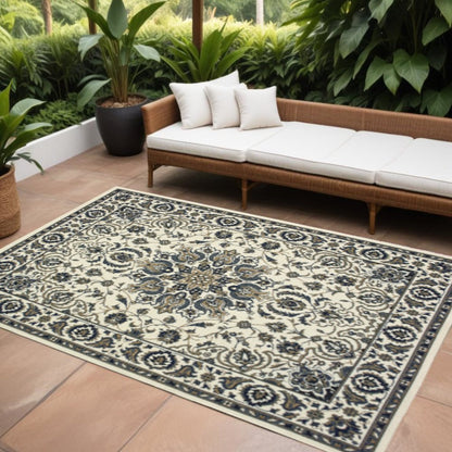 8' X 11' Ivory and Blue Oriental Stain Resistant Indoor Outdoor Area Rug