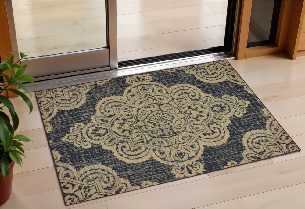 2' X 4' Black and Tan Oriental Stain Resistant Indoor Outdoor Area Rug