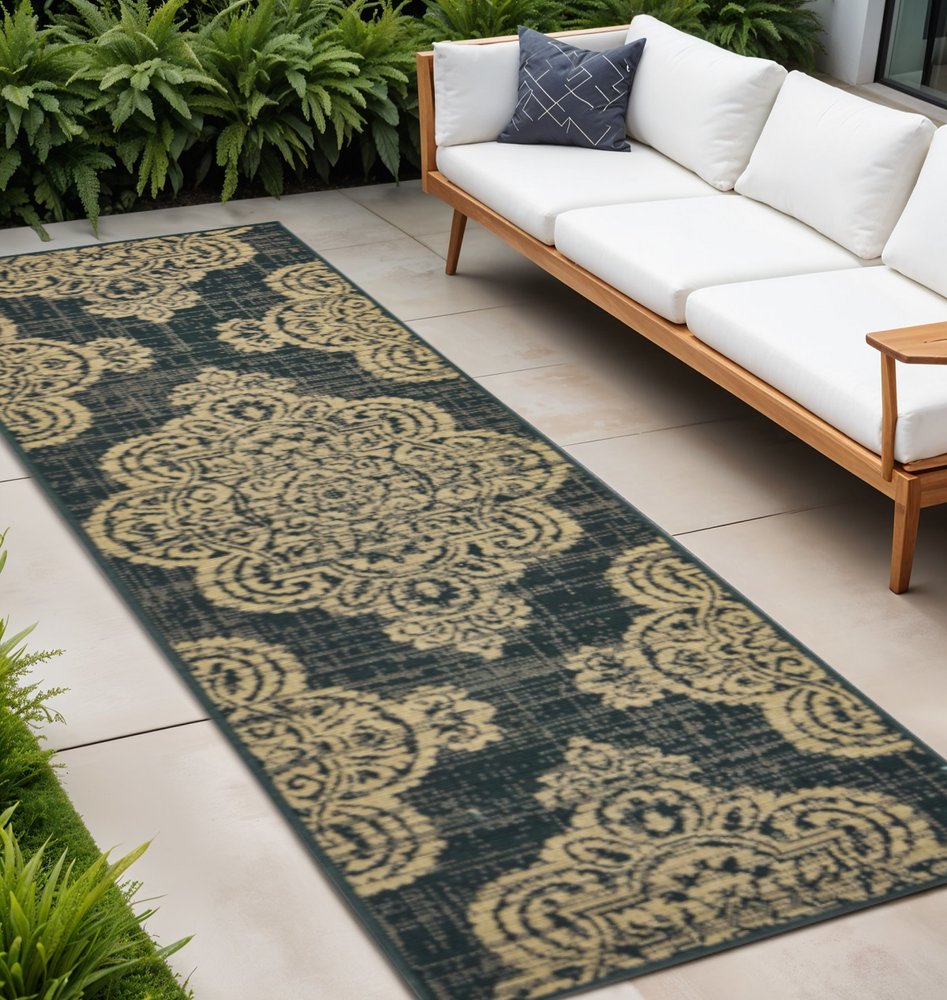 2' X 8' Black and Tan Oriental Stain Resistant Indoor Outdoor Area Rug