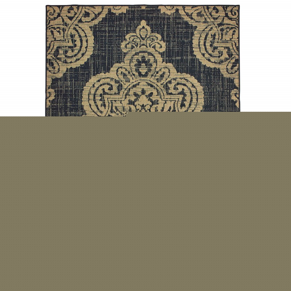 5' X 8' Black and Tan Oriental Stain Resistant Indoor Outdoor Area Rug