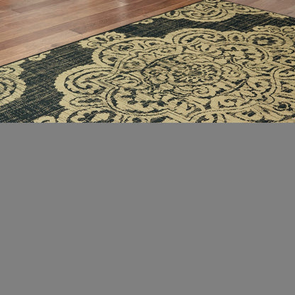 5' X 8' Black and Tan Oriental Stain Resistant Indoor Outdoor Area Rug