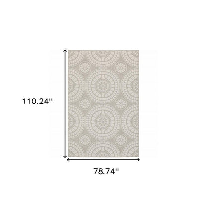 7' X 9' Gray and Ivory Geometric Stain Resistant Indoor Outdoor Area Rug