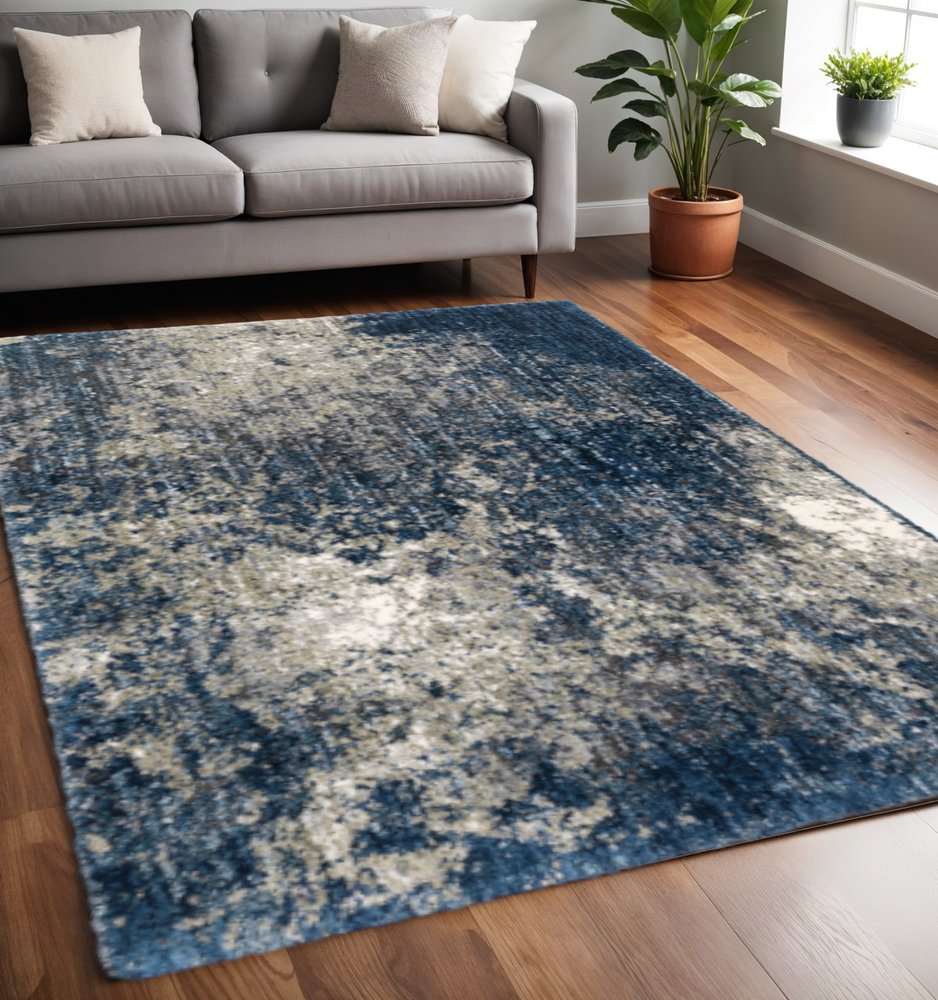 5' X 8' Blue And Grey Abstract Shag Power Loom Stain Resistant Area Rug